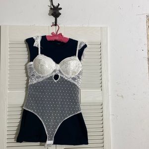 Ladies are all in one new with tags white size large